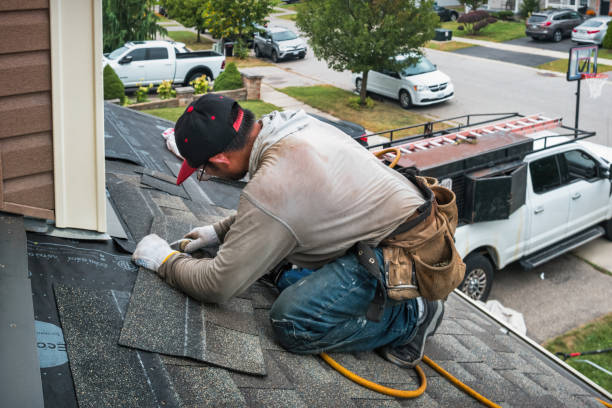 Professional Roofing technician working in Teaneck, NJ